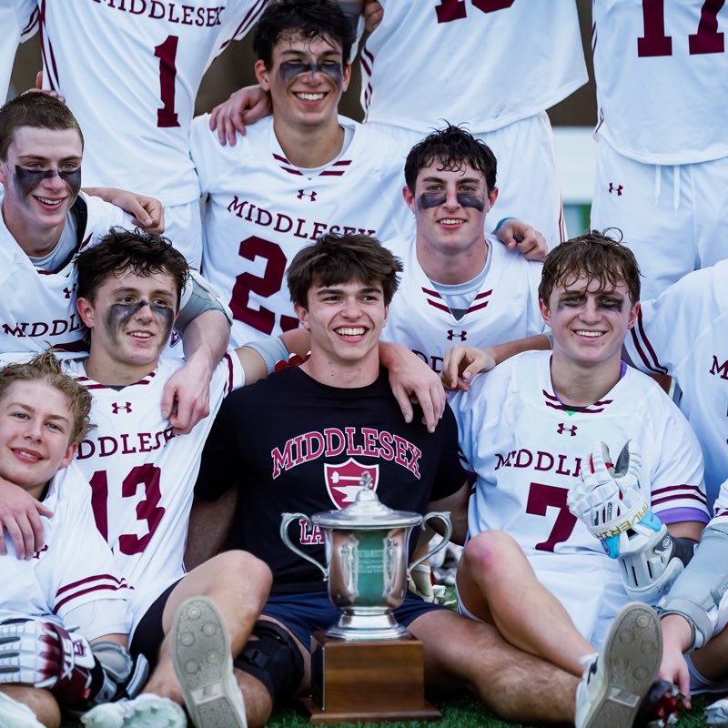 Trophy lift celebration, lacrosse, by Kate Sardone